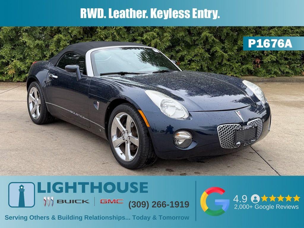 2008 Pontiac Solstice Base in Deep (Dark Blue Metallic) — front three-quarter view