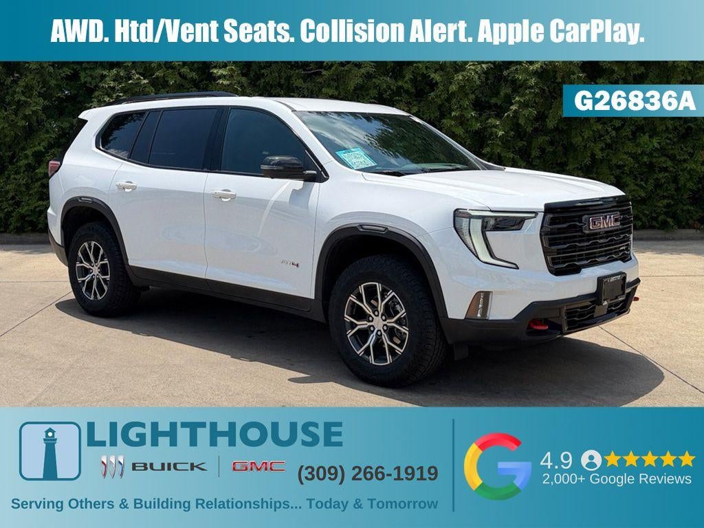 2024 GMC Acadia AT4 in Summit White — front three-quarter view