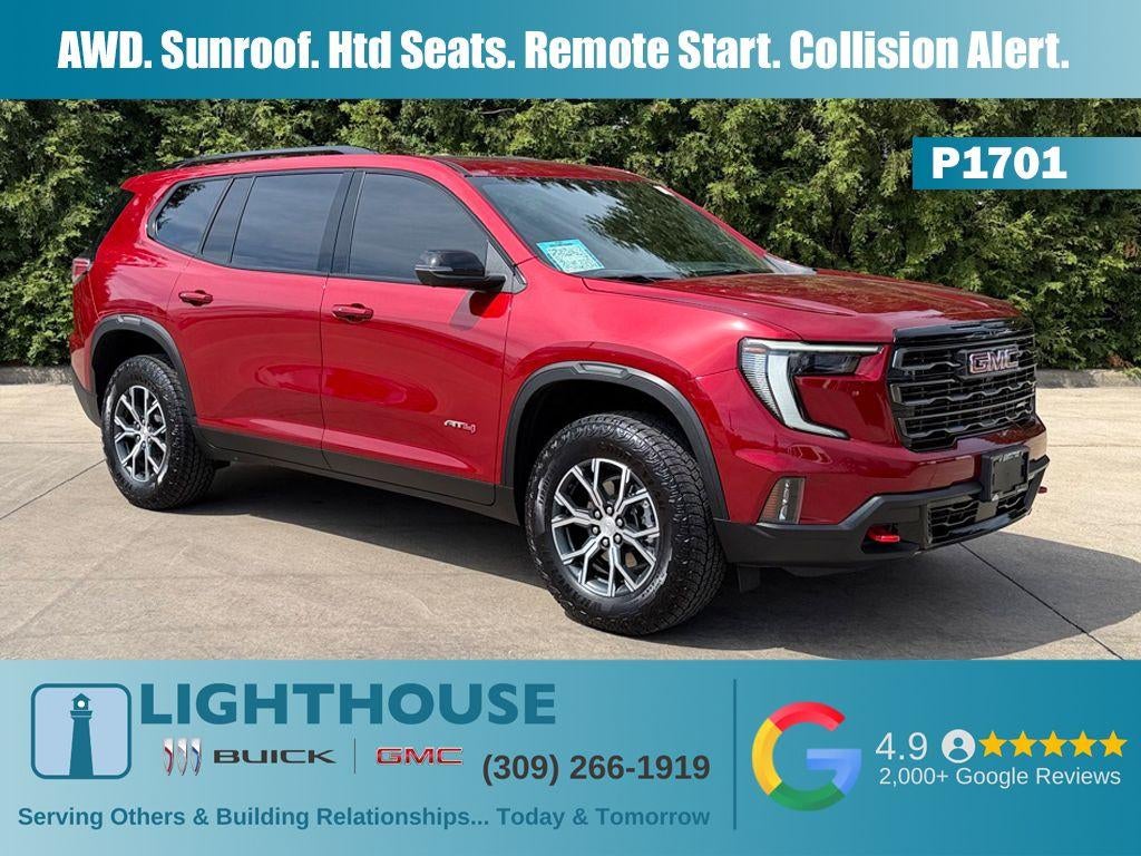 2025 GMC Acadia AT4 in Volcanic Red Tintcoat — front three-quarter view