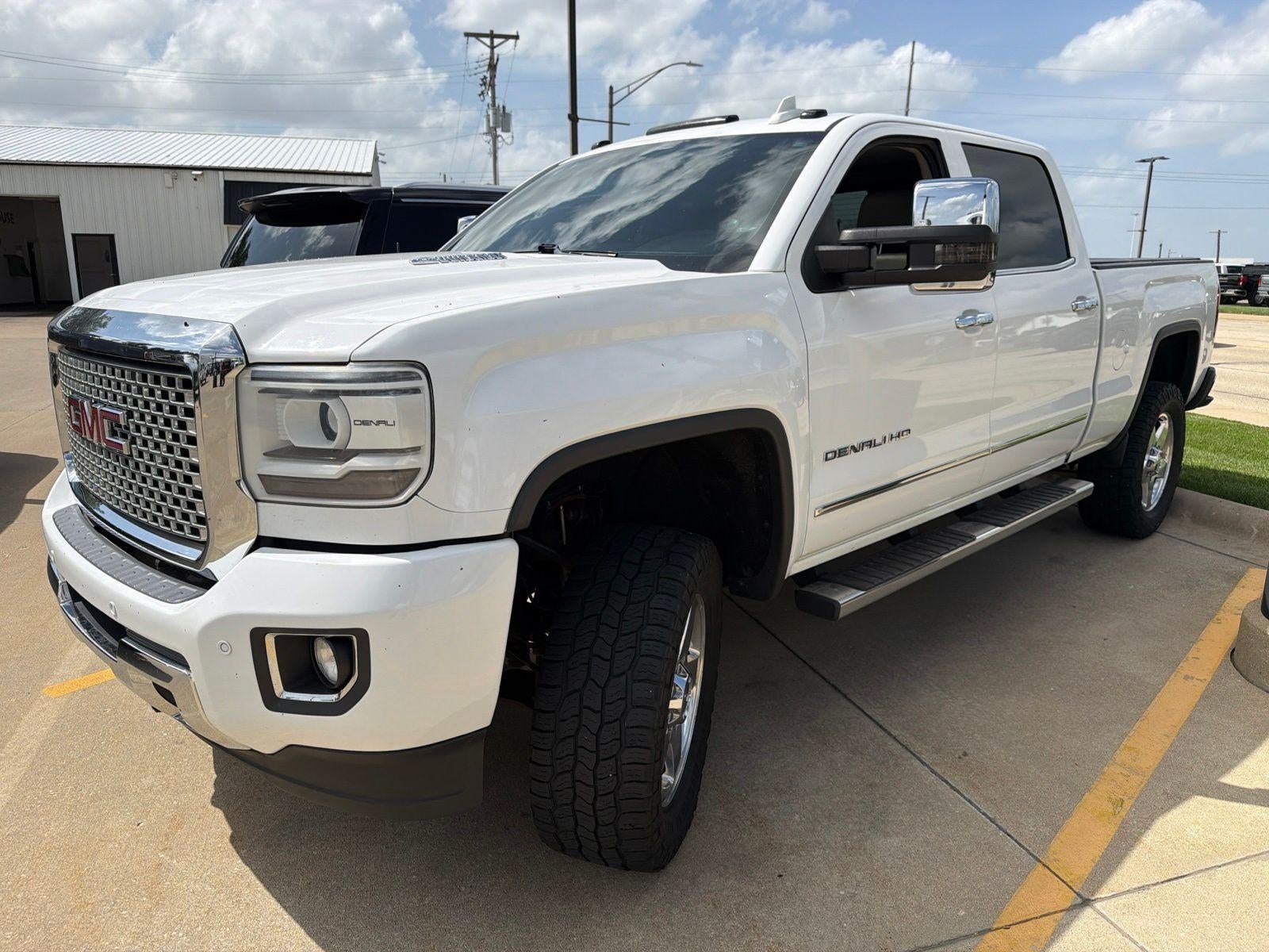 2015 GMC Sierra 2500 HD Denali in Summit White — front three-quarter view