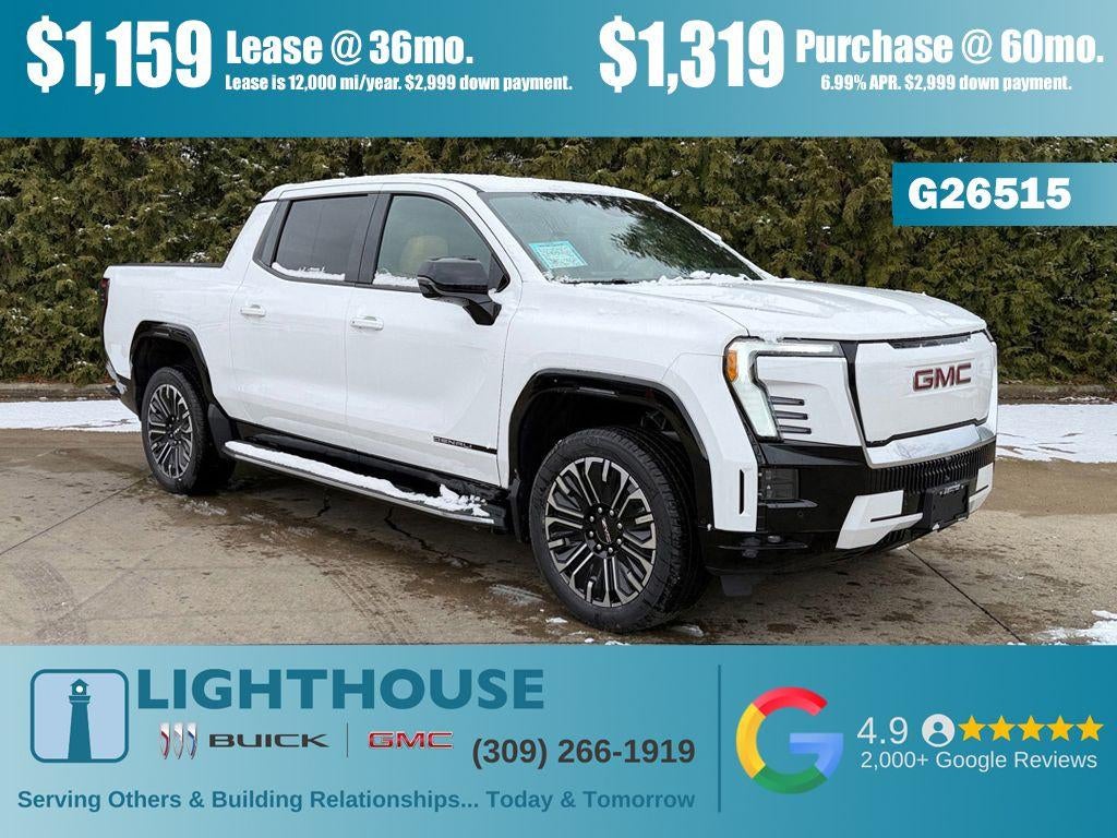2026 GMC Sierra EV Standard Range Denali in Summit White — front three-quarter view