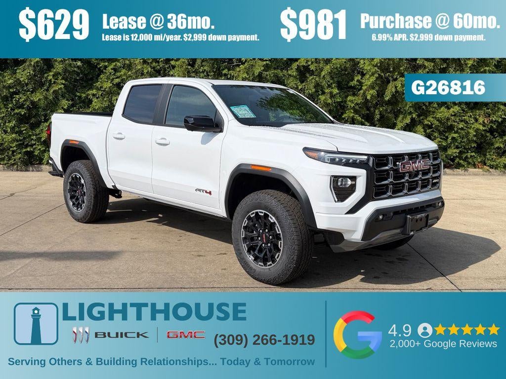 2026 GMC Canyon 4WD AT4 in Summit White — front three-quarter view