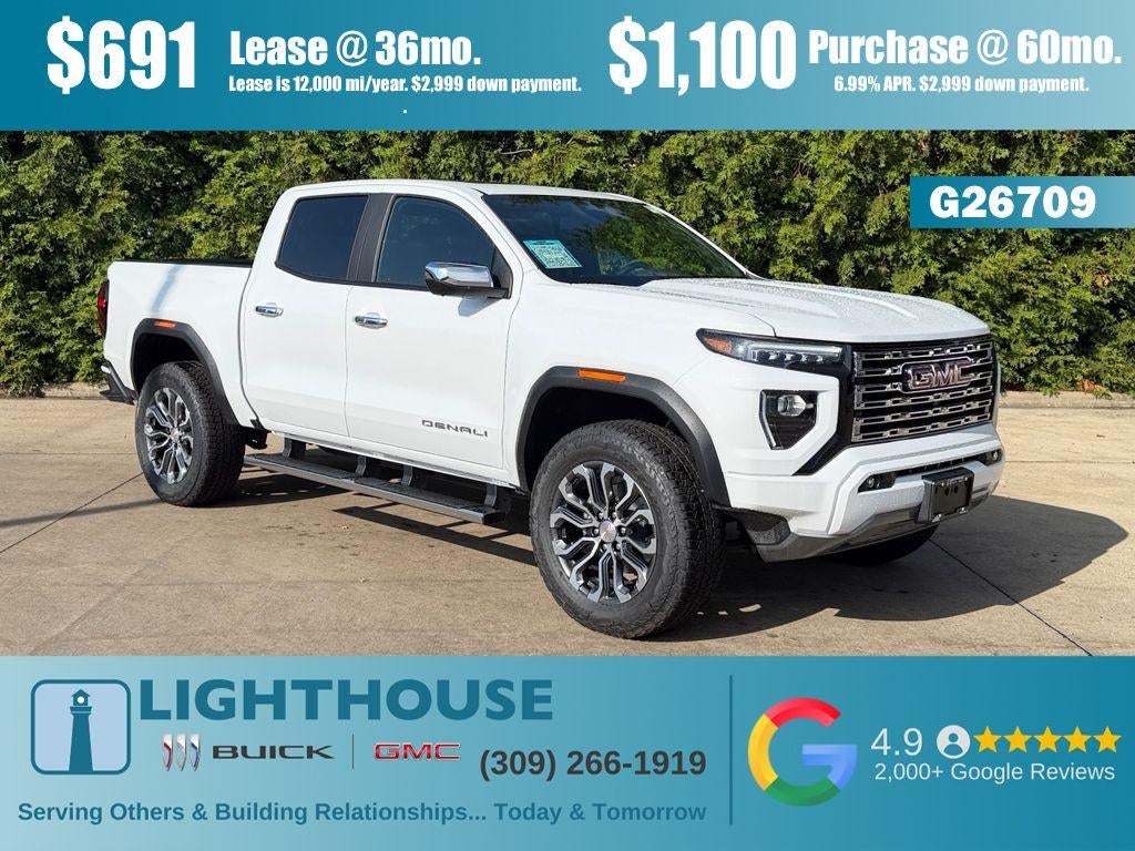 2026 GMC Canyon 4WD Denali in Summit White — front three-quarter view