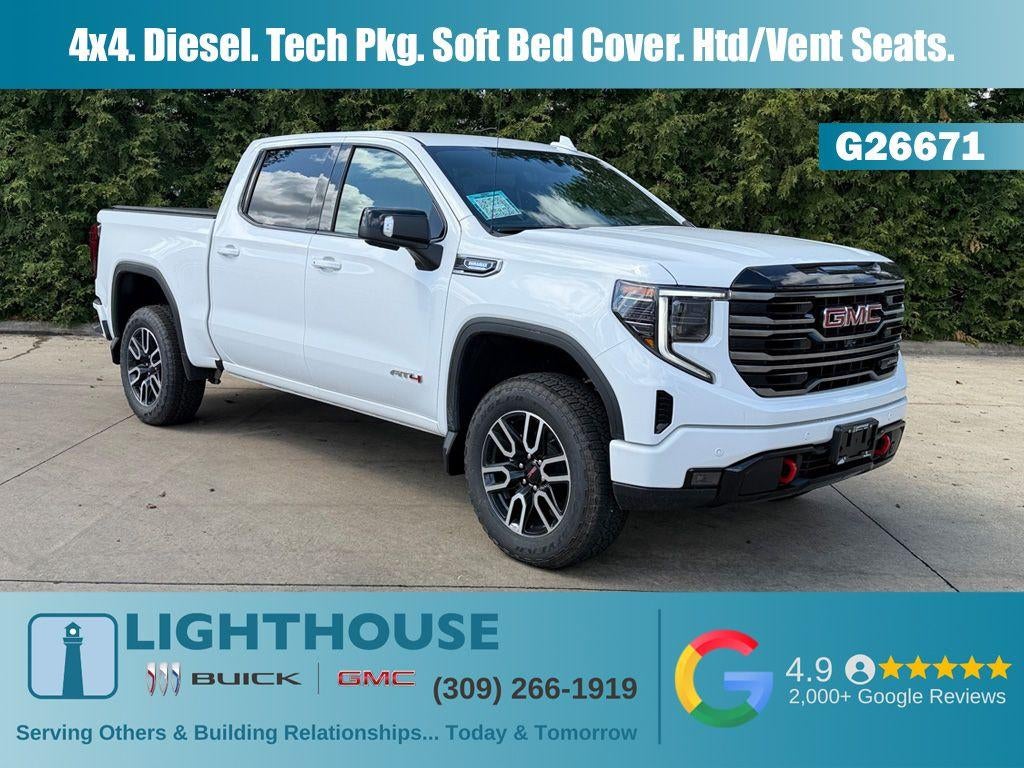 2026 GMC Sierra 1500 AT4 in Summit White — front three-quarter view