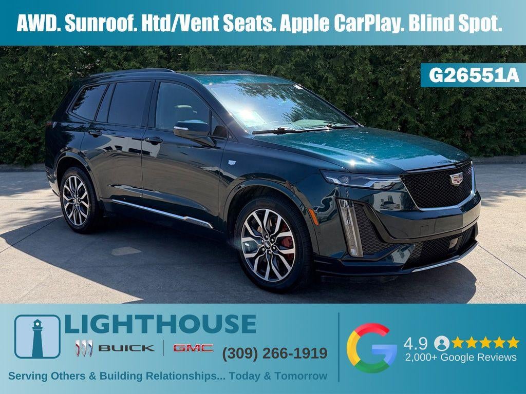 2024 Cadillac XT6 Sport in Emerald Lake Metallic — front three-quarter view