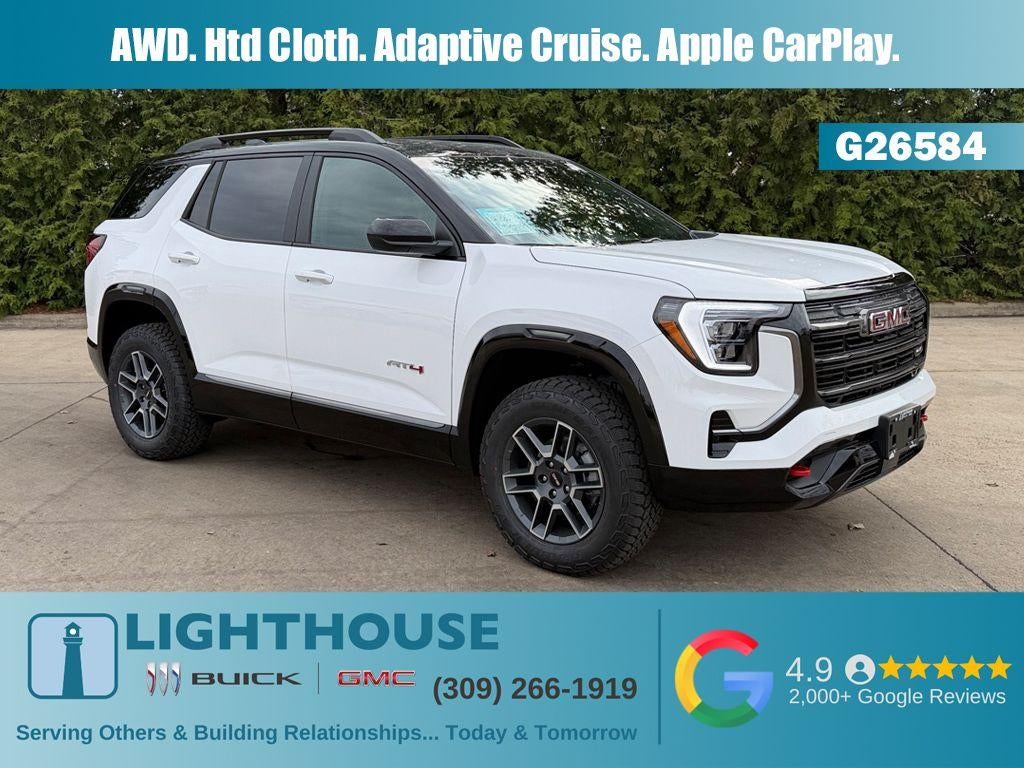 2026 GMC Terrain AWD AT4 in Summit White — front three-quarter view