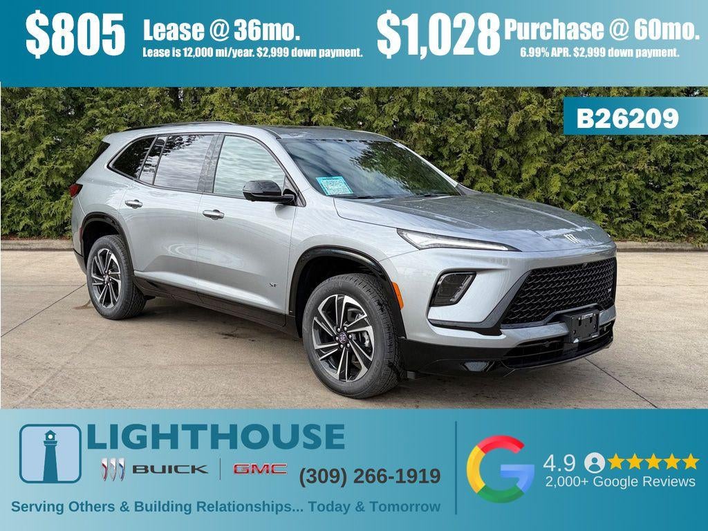 2026 Buick Enclave Sport Touring in Moonstone Gray Metallic — front three-quarter view