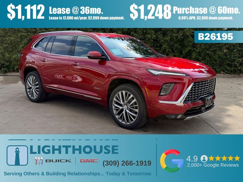 2026 Buick Enclave Avenir in Cherry Red Tintcoat — front three-quarter view