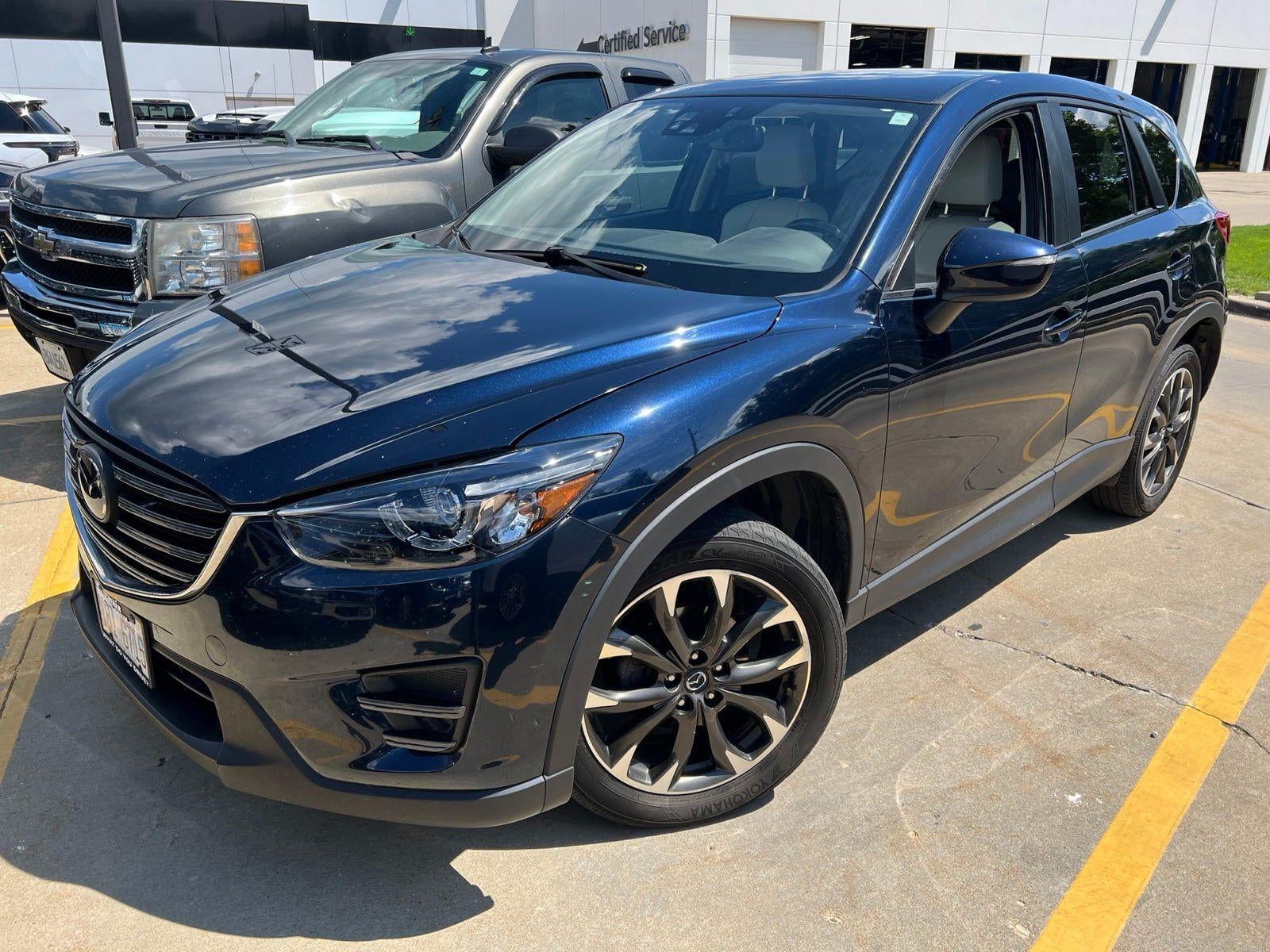 2016 Mazda Mazda CX-5 Grand Touring in Blue — front three-quarter view