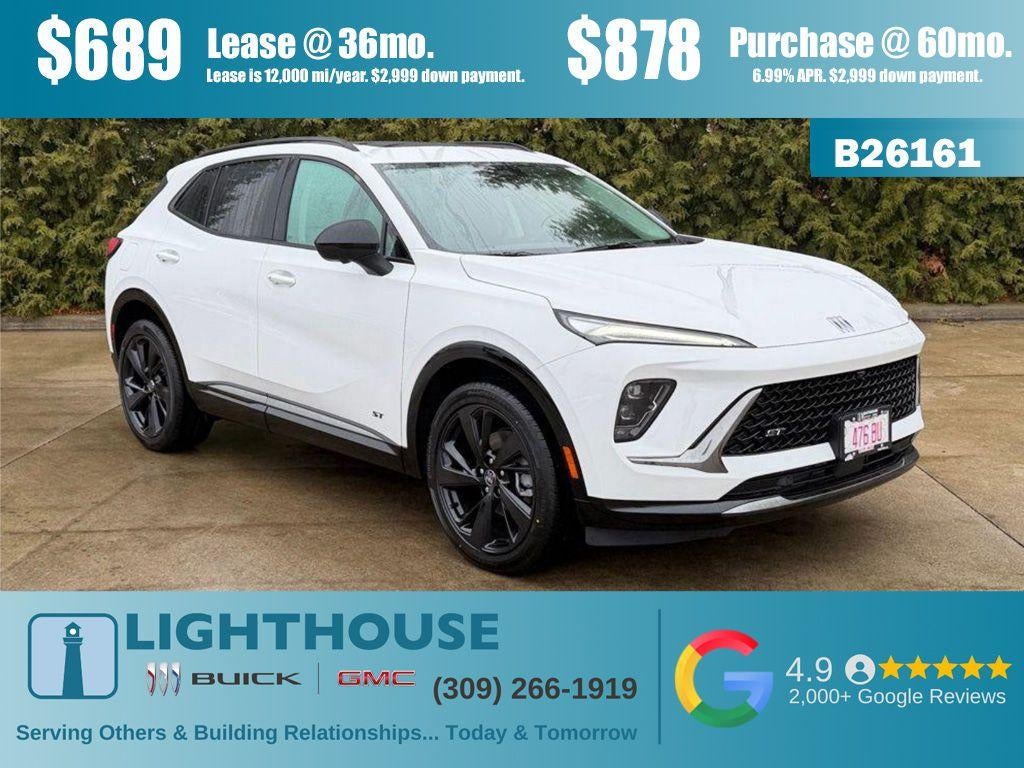 2026 Buick Envision Sport Touring in Summit White — front three-quarter view